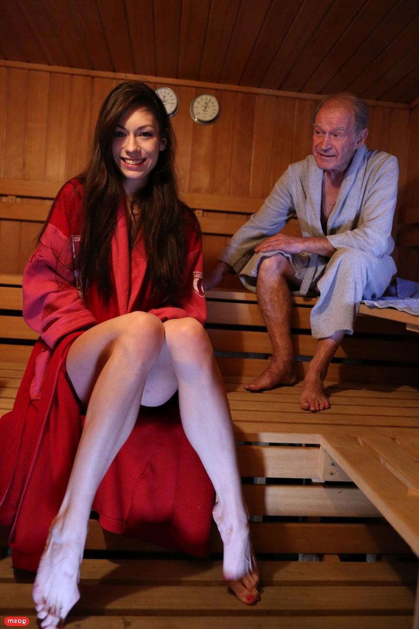 15P Naughty brunette Arwen Gold shows her pussy while with an old man in the sauna