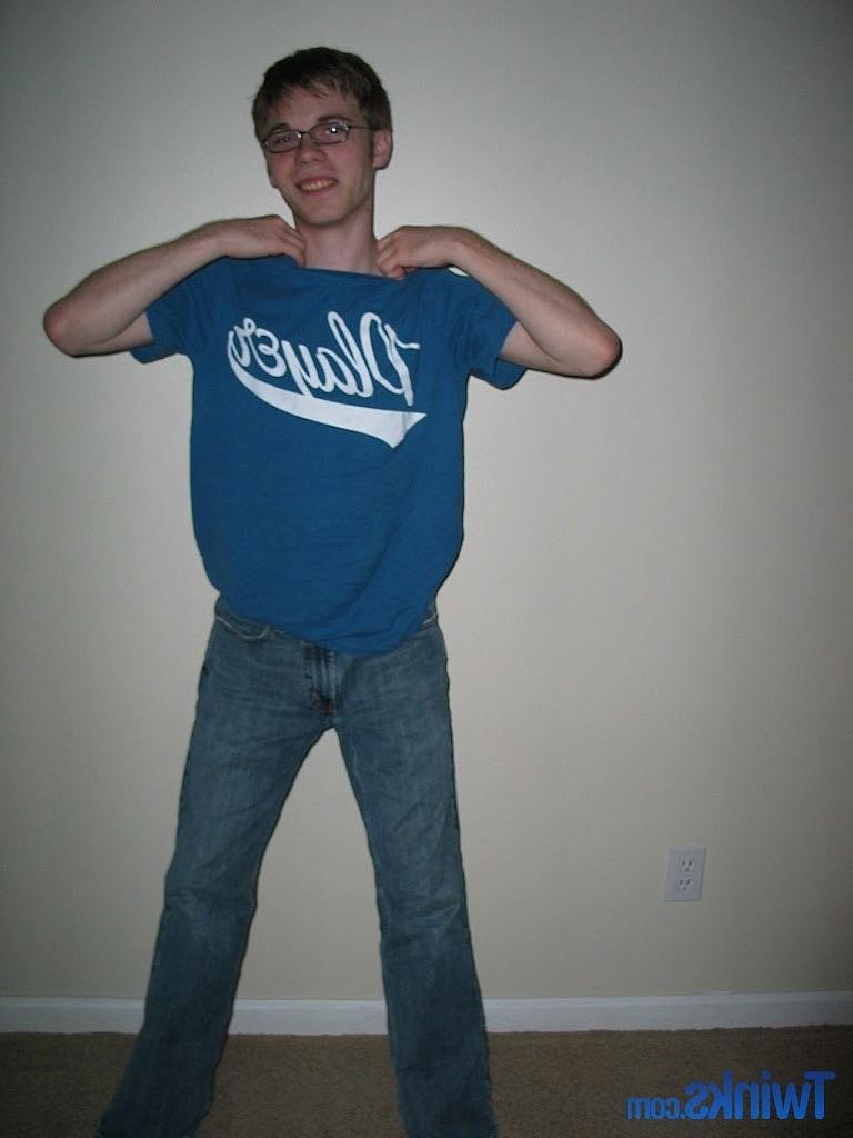 20P Nerdy twink Billy Gee loses his shirt and jeans and jerks off his massive dick
