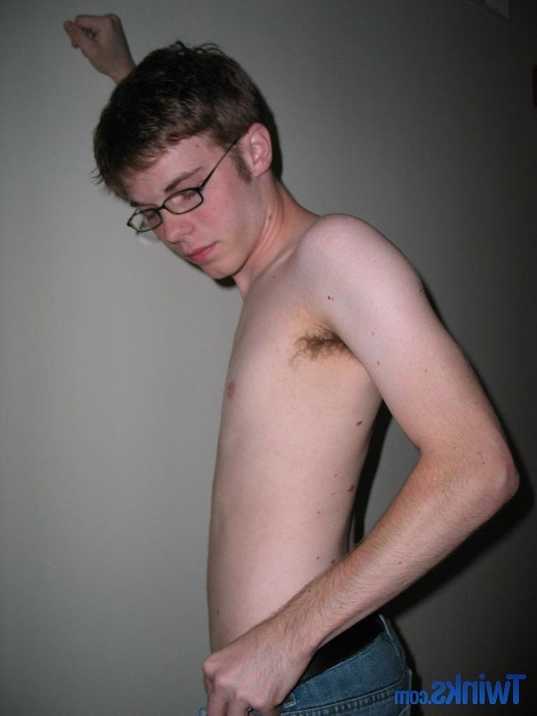 20P Nerdy twink Billy Gee loses his shirt and jeans and jerks off his massive dick