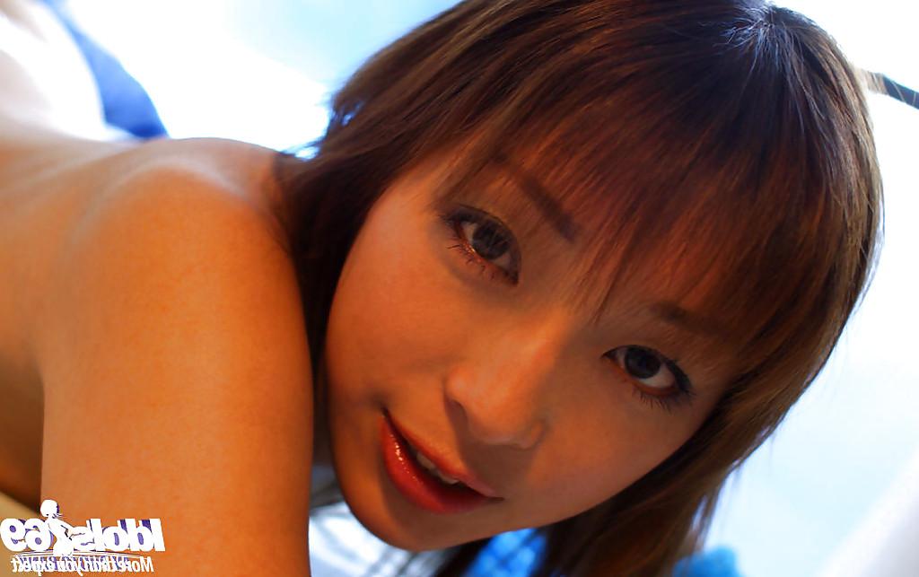 16P Tempting asian coed with puffy nipples stripping on the bed