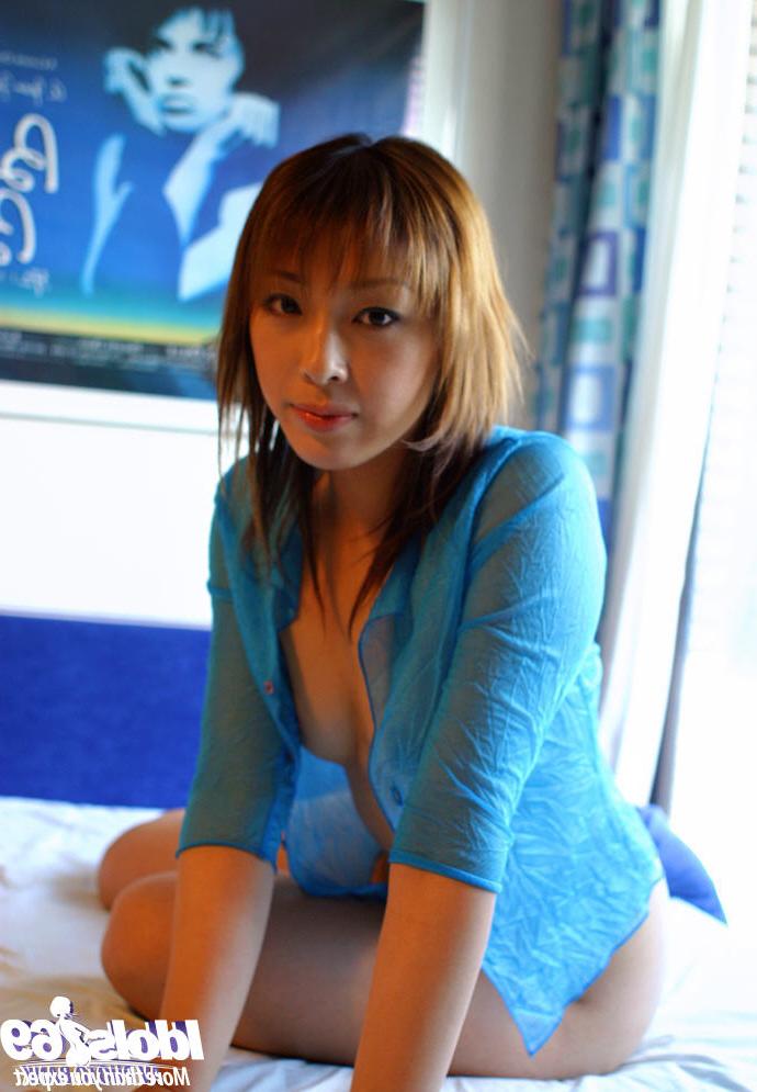 16P Tempting asian coed with puffy nipples stripping on the bed