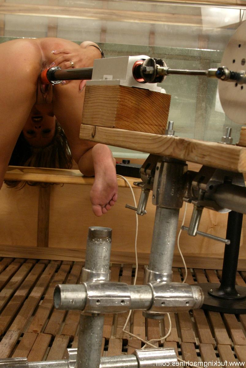 20P Hot Jennifer Luv bends over a table & gets her muff filled by a dildo machine