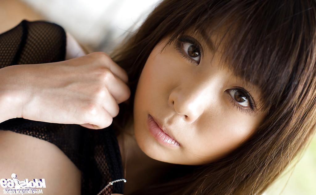 15P Seductive asian coed Aya Hirai uncovering her sweet tits and hairy cunt