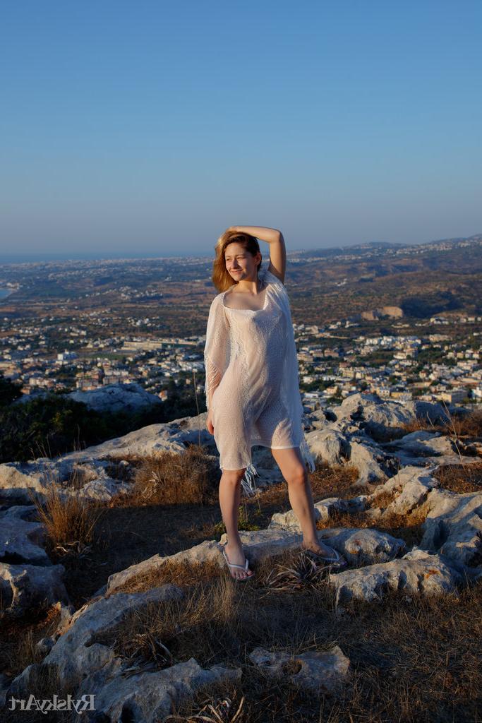 16P Young redhead Katty Muss models sheer attire prior to showering in the nude