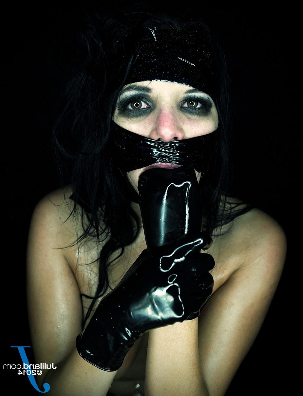 15P Kinky Latina in latex Missy Martinez massages her big tits & fists her mouth