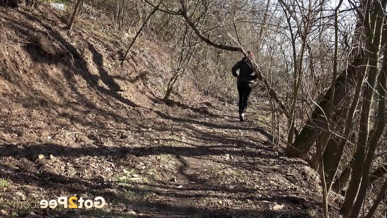 15P Caucasian girl Antonia Sainz pulls down leather pants to pee in the woods