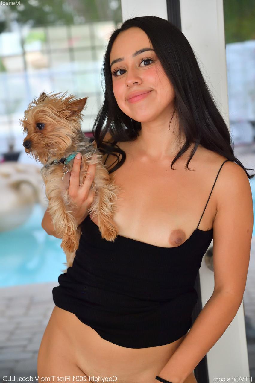 20P Raven-haired Latina Merisol stripping and toying herself poolside