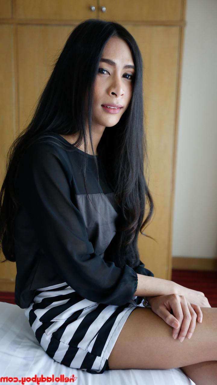 20P Raven-haired Asian ladyboy Pang posing in her hot outfits at the hotel room