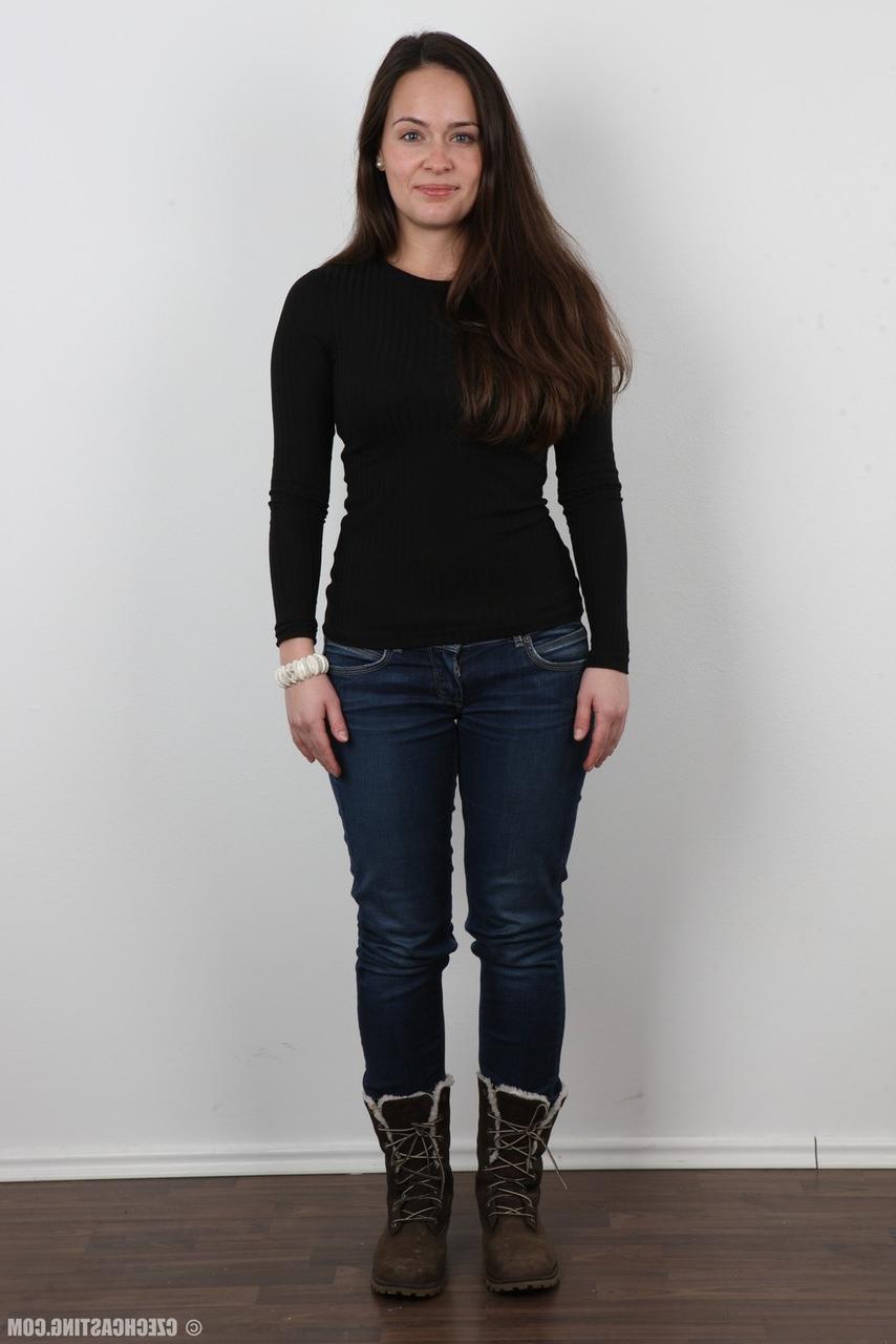 20P Gorgeous brunette in jeans peels slowly for this photo striptease series