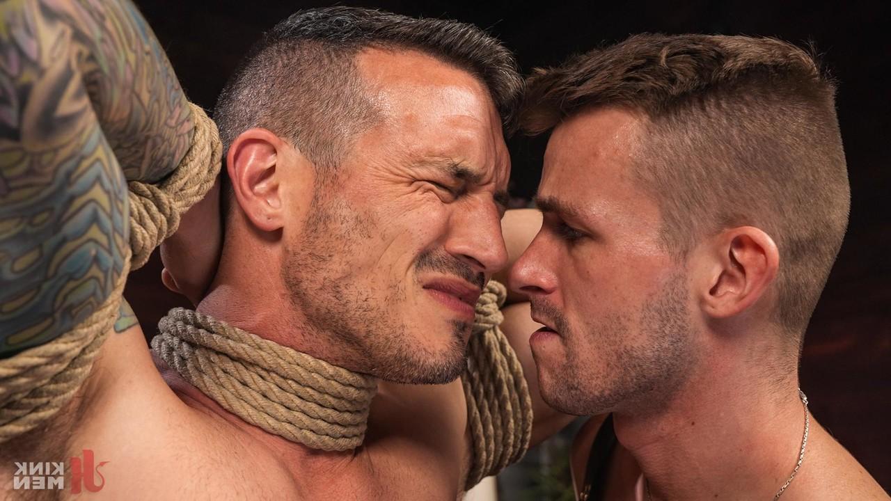 20P Dirty inked gay Lane Colten gets tied up and fucked by a horny gay dom