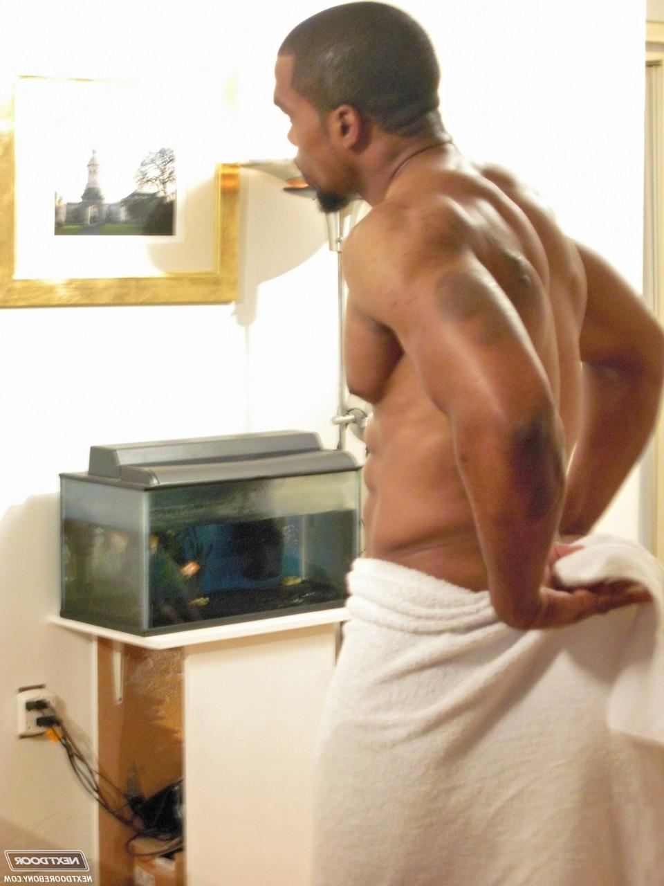 20P Muscular hunk Boxer shows his big black prick and masturbates until he cums