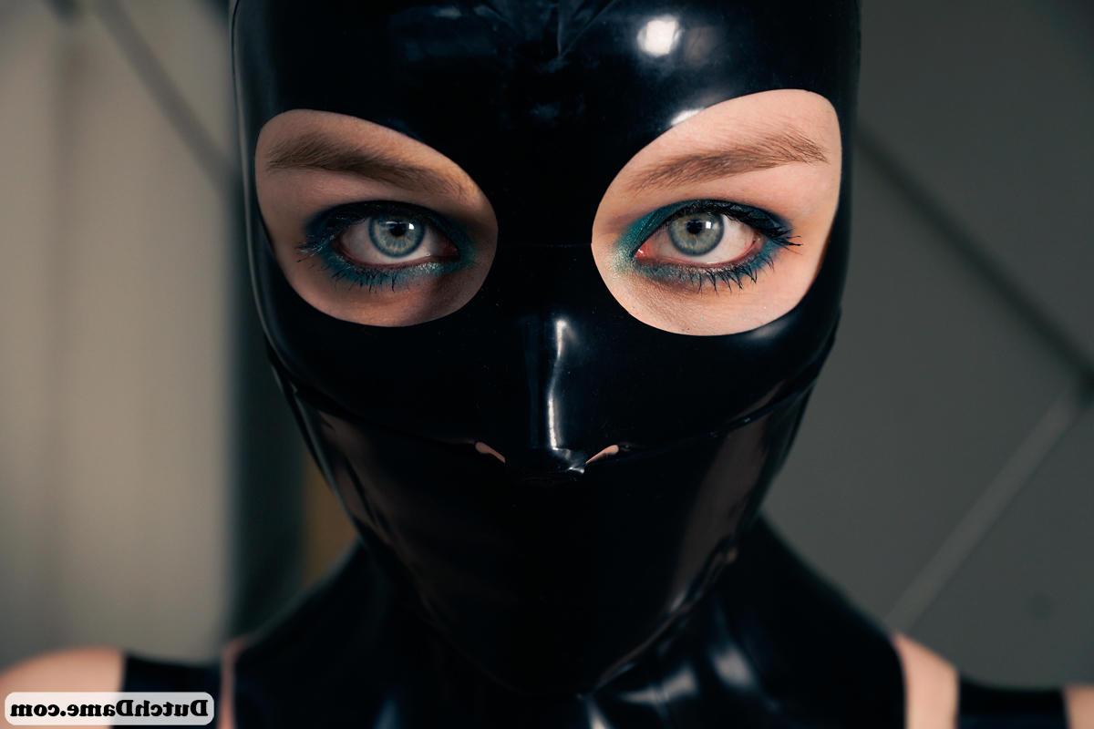 16P Sexy slut in latex leggings dons latex mask & cuffs to model in tight dress