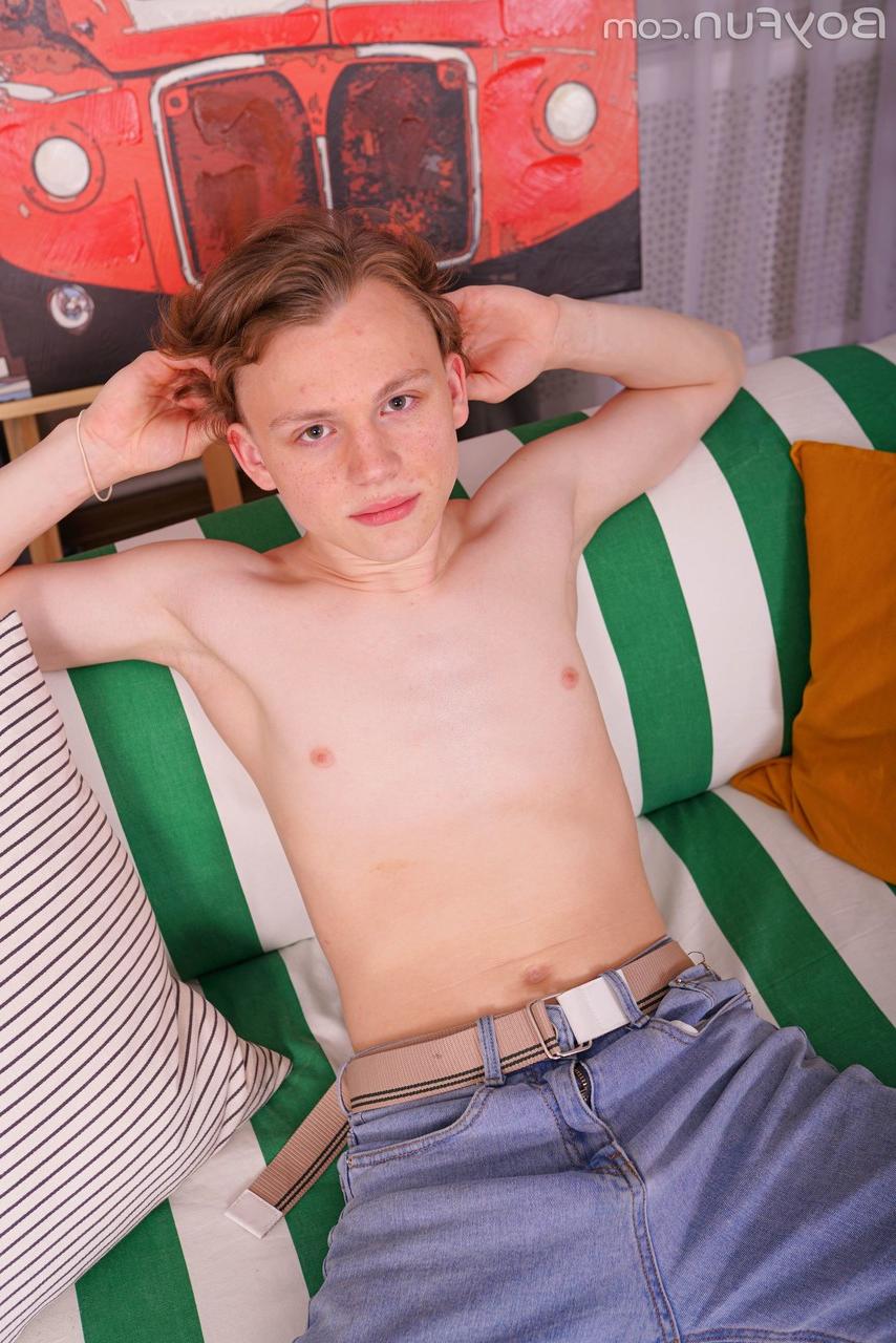 20P Adorable gay model Tom Heart grabs his big uncut dick and strokes it