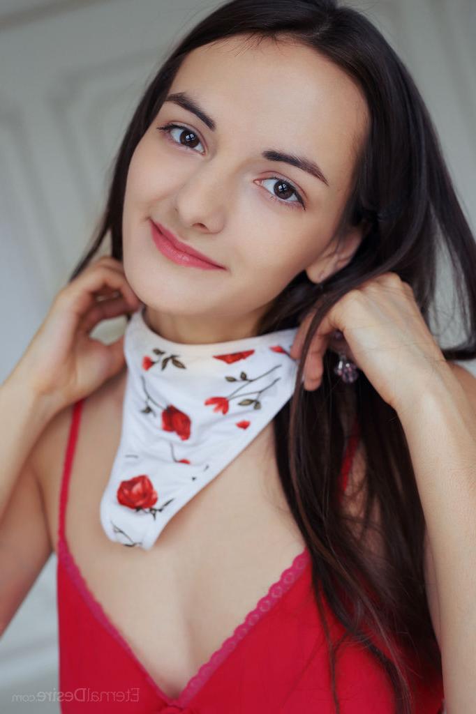 16P Dark haired teen with a pretty face gets around to baring her bald snatch