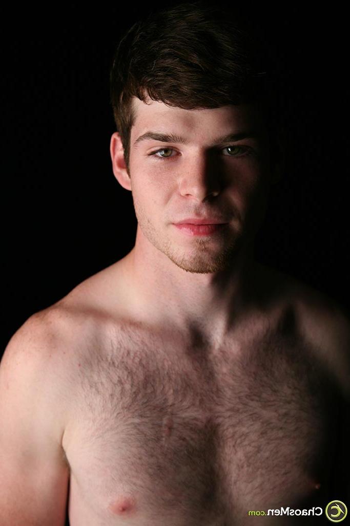 20P Gorgeous brunette twink Jebidiah with a hairy chest strokes his hard big cock