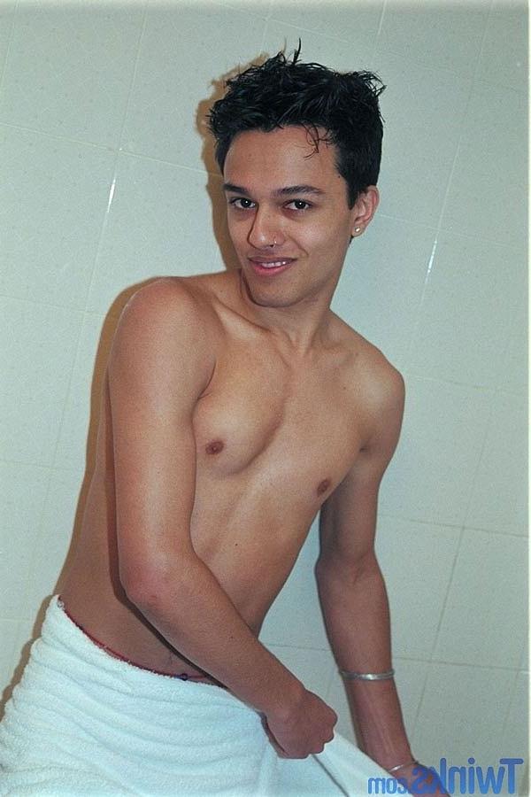 20P Exotic twink Rhanni doffs his towel and toys his anus and jerks his cock