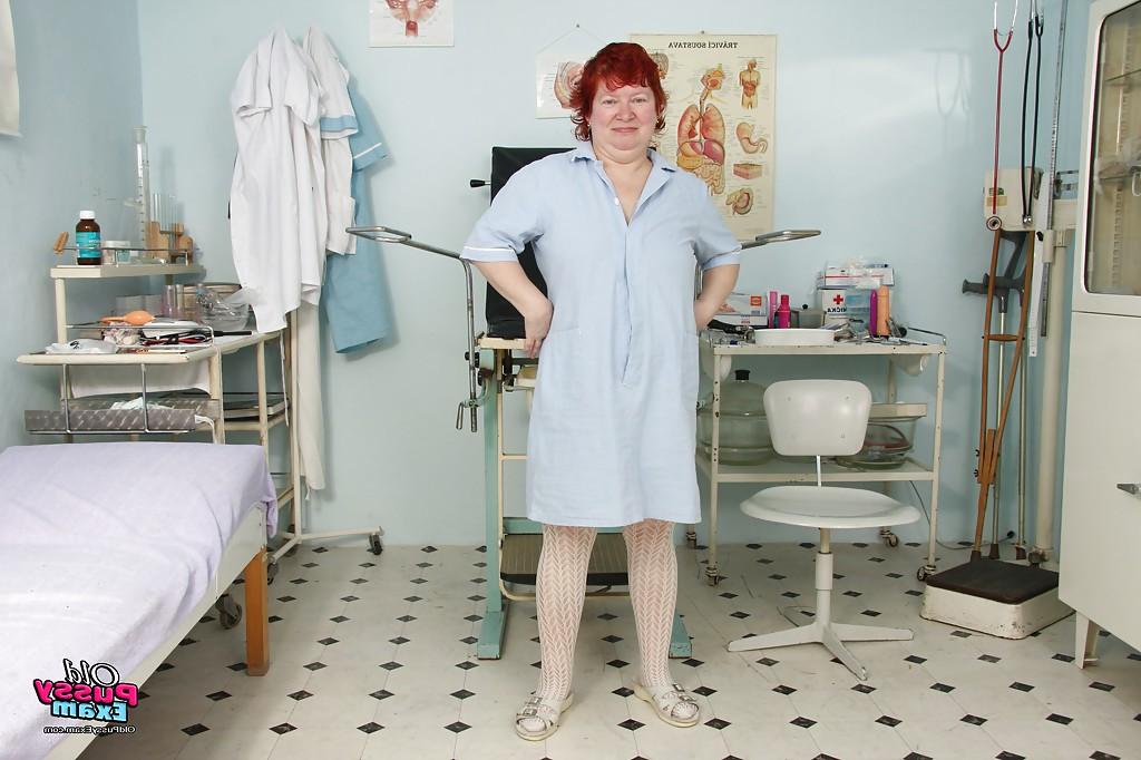 16P Fatty granny with flabby jugs and hairy muff taking off her nurse uniform