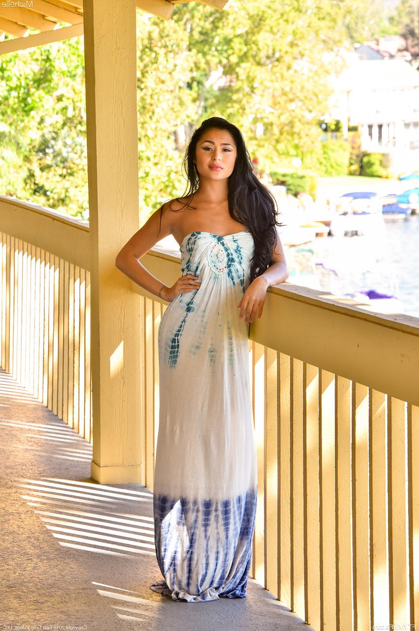 17P Lubricious Michelle in flowing dress flashes boobs and pussy on the terrace