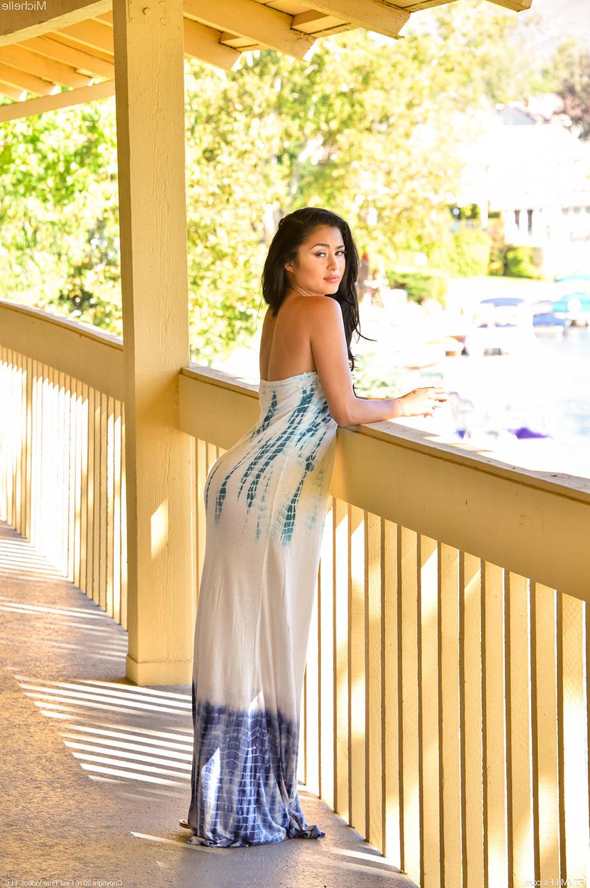 17P Lubricious Michelle in flowing dress flashes boobs and pussy on the terrace