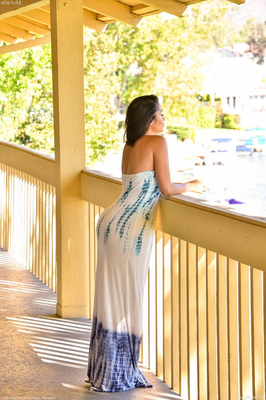 17P Lubricious Michelle in flowing dress flashes boobs and pussy on the terrace