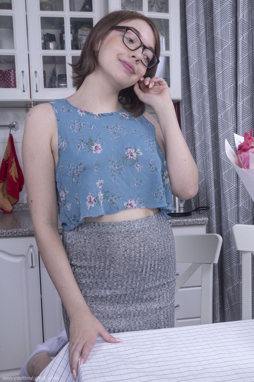 20P Amateur nerd Abby spreading her super furry coochie on the kitchen counter