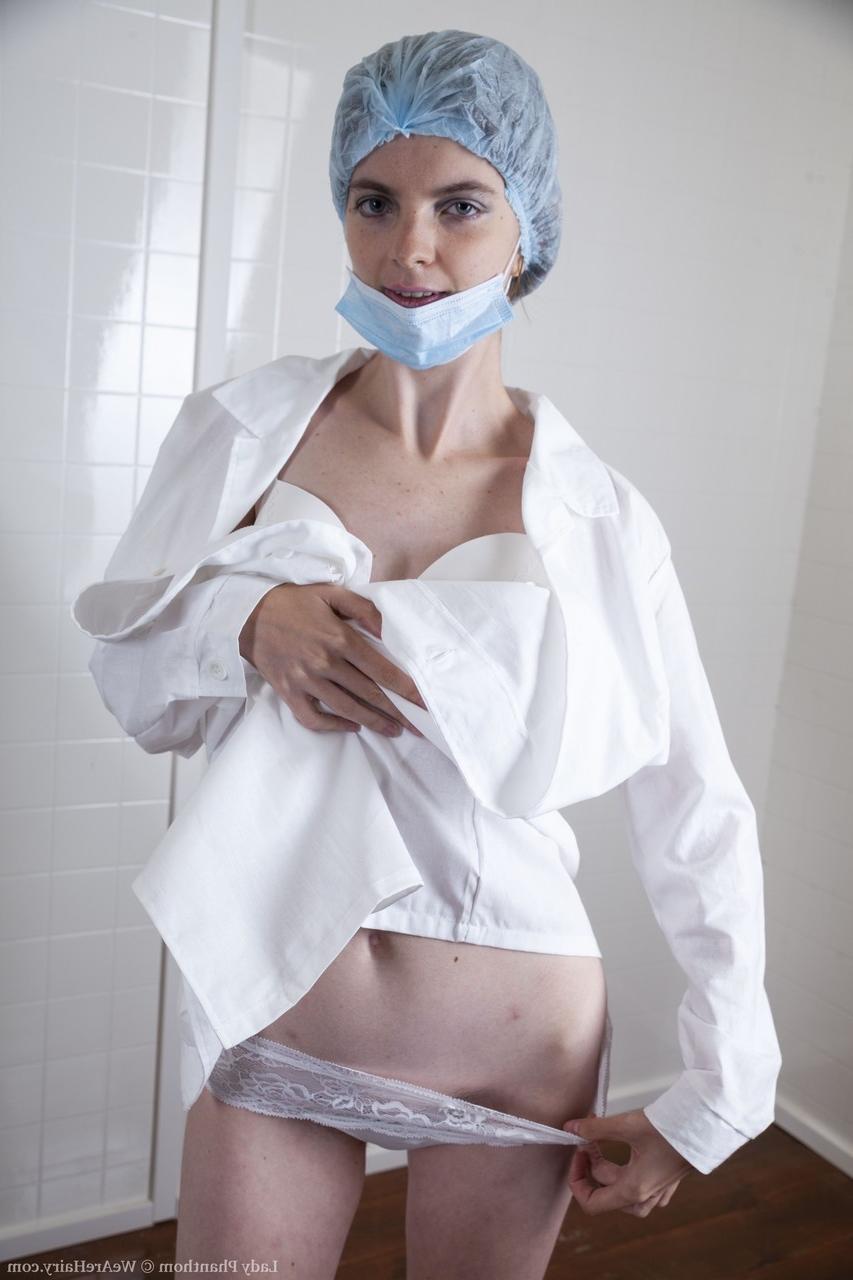 20P Horny amateur nurse with hairy armpits Lady Phanthom flaunts her bush