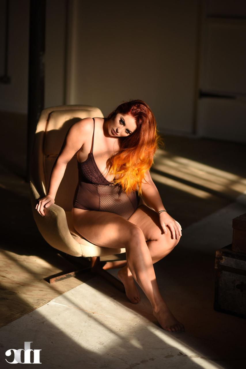 20P Chubby redhead Lucy Vixen shows off her big tits and her great ass