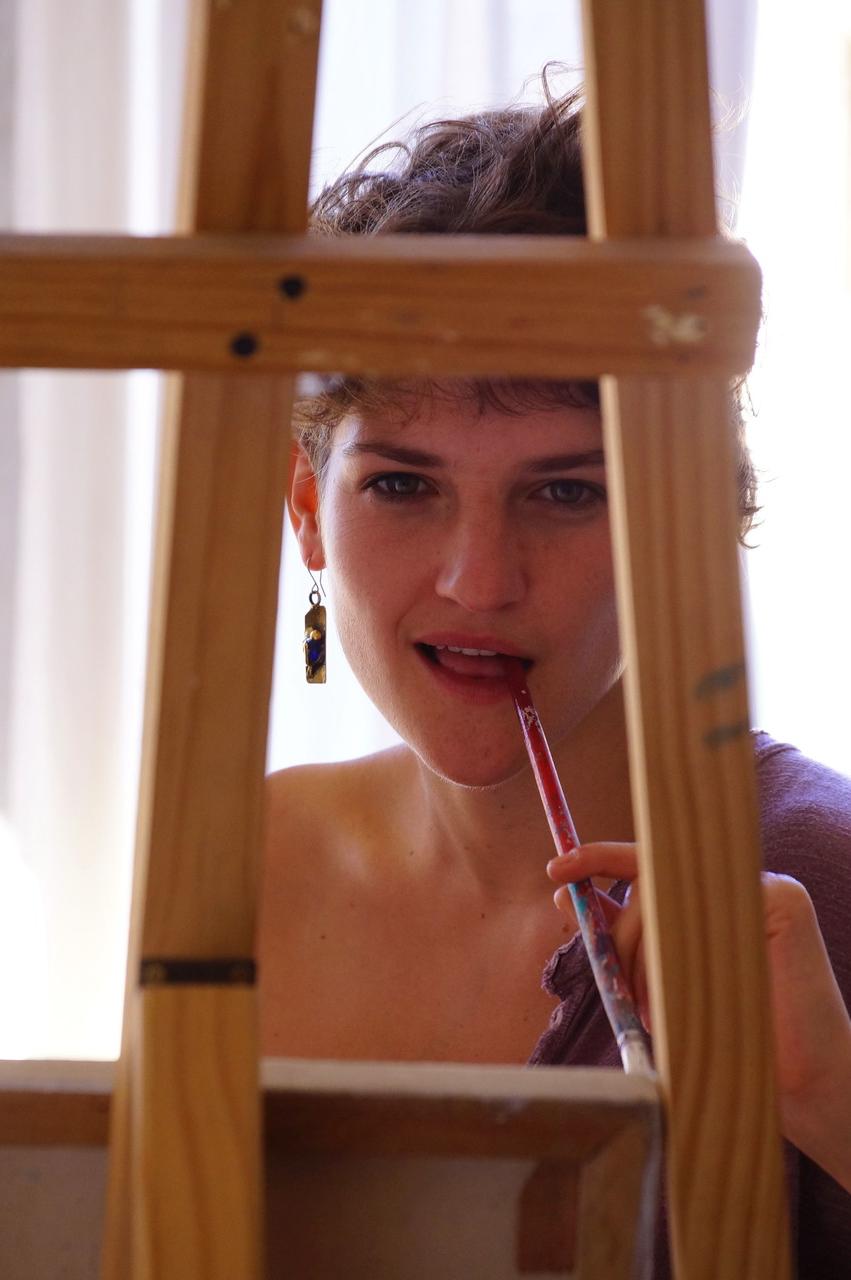 17P Short haired artist Izabella inserts a paint brush deep inside her hairy twat