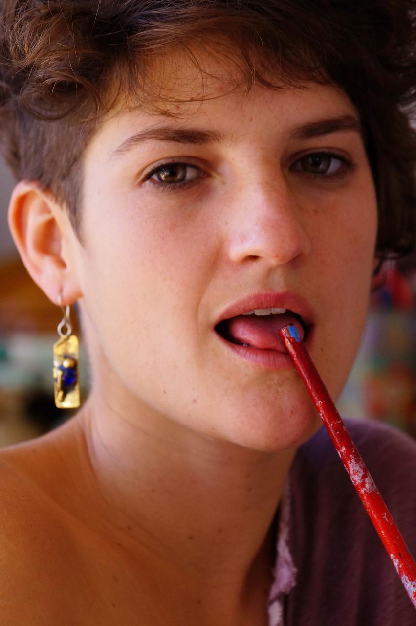 17P Short haired artist Izabella inserts a paint brush deep inside her hairy twat