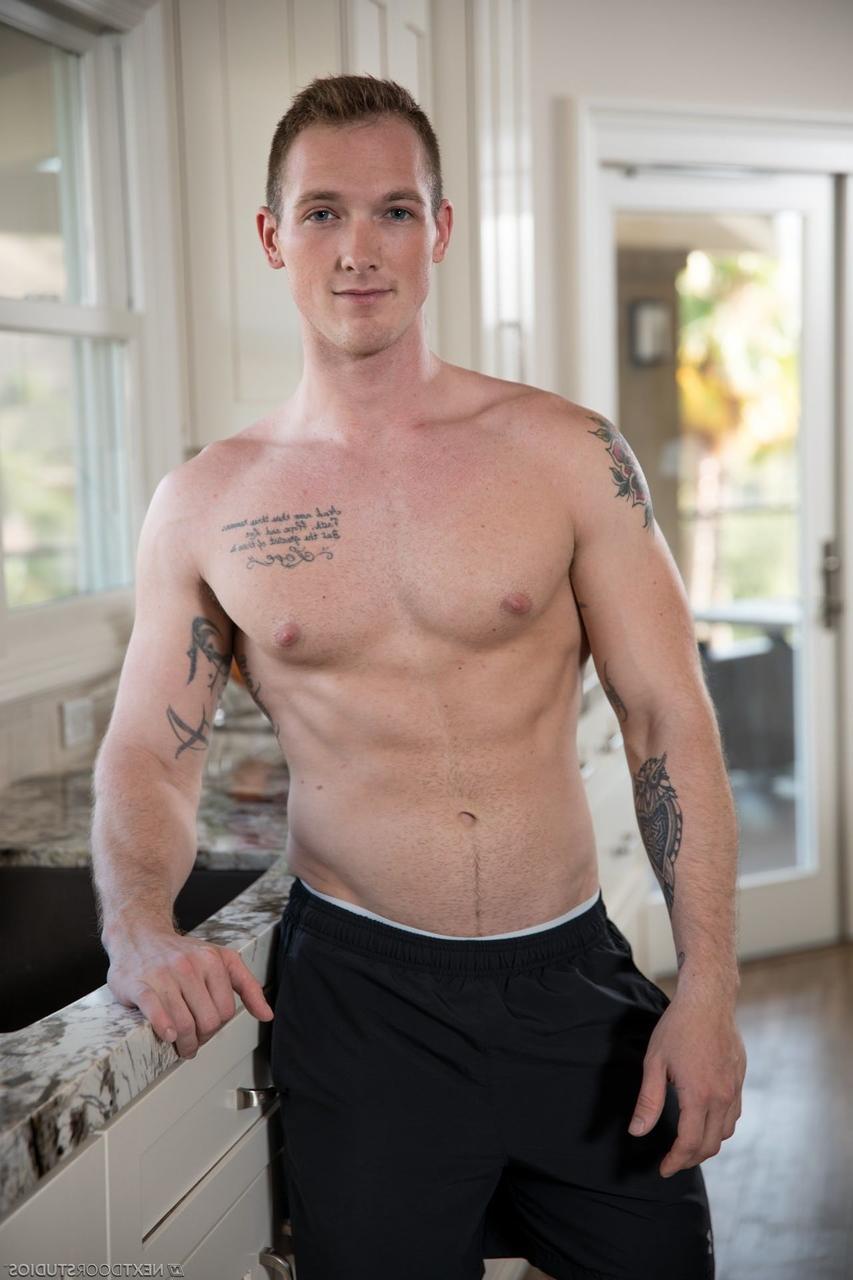 20P Redheaded twink Alex Tanner has a gay threesome with muscular studs