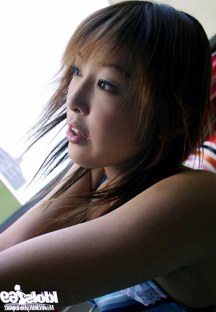 16P Lustful asian coed with ample ass stripping off her clothes