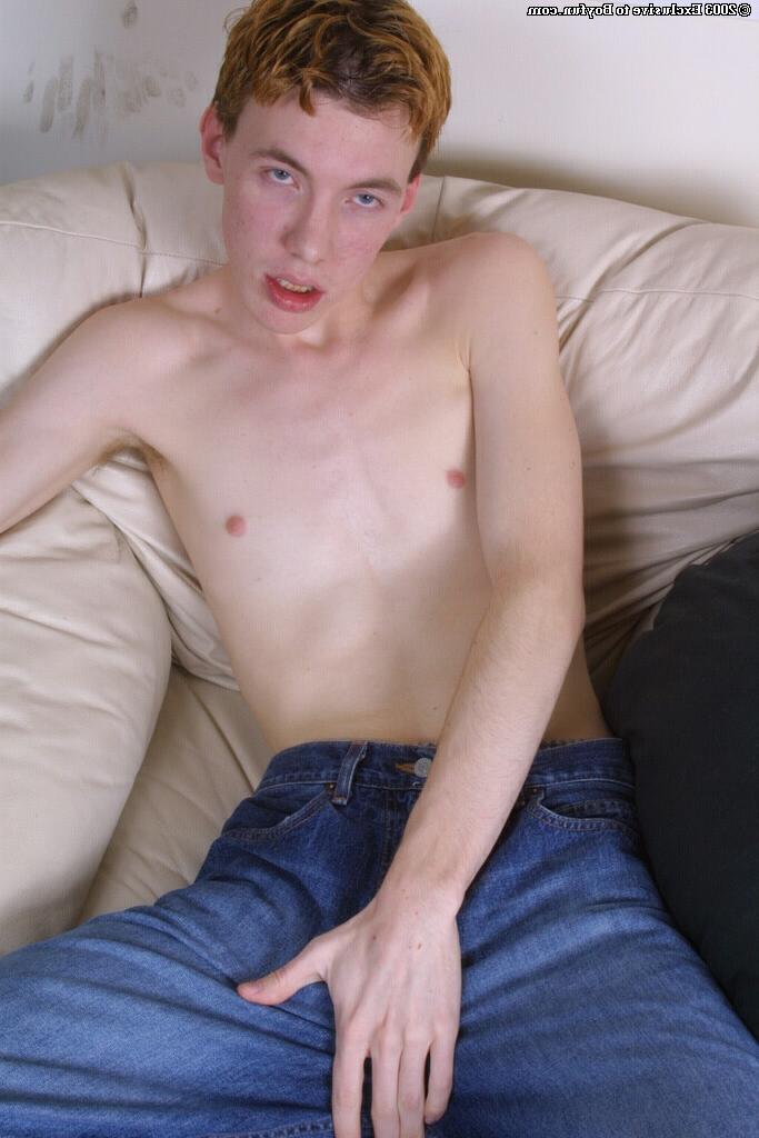 20P Horny redheaded gay boy Dan strips down naked and jerks his hard cock