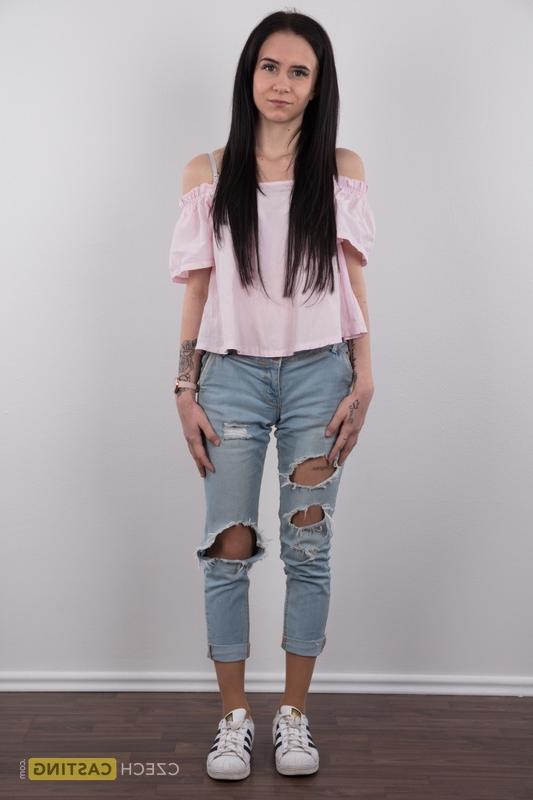 18P Long haired female Barbora models in ripped jeans before standing bare naked