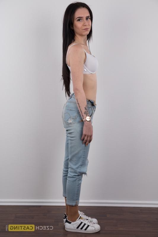 18P Long haired female Barbora models in ripped jeans before standing bare naked