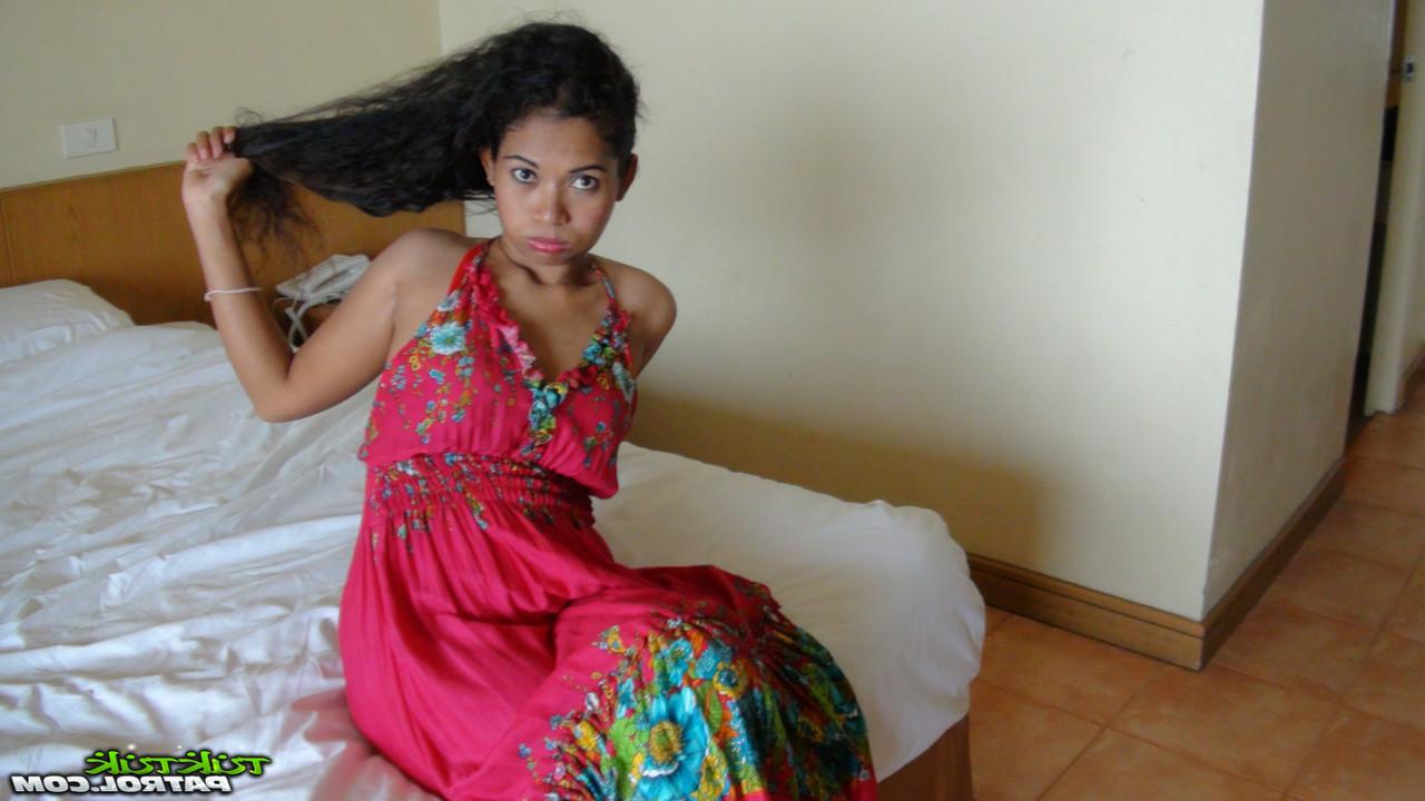 20P Curly-haired Thai babe Nees shows her beautiful tits & her bald cunt