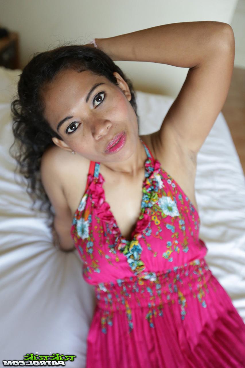 20P Curly-haired Thai babe Nees shows her beautiful tits & her bald cunt