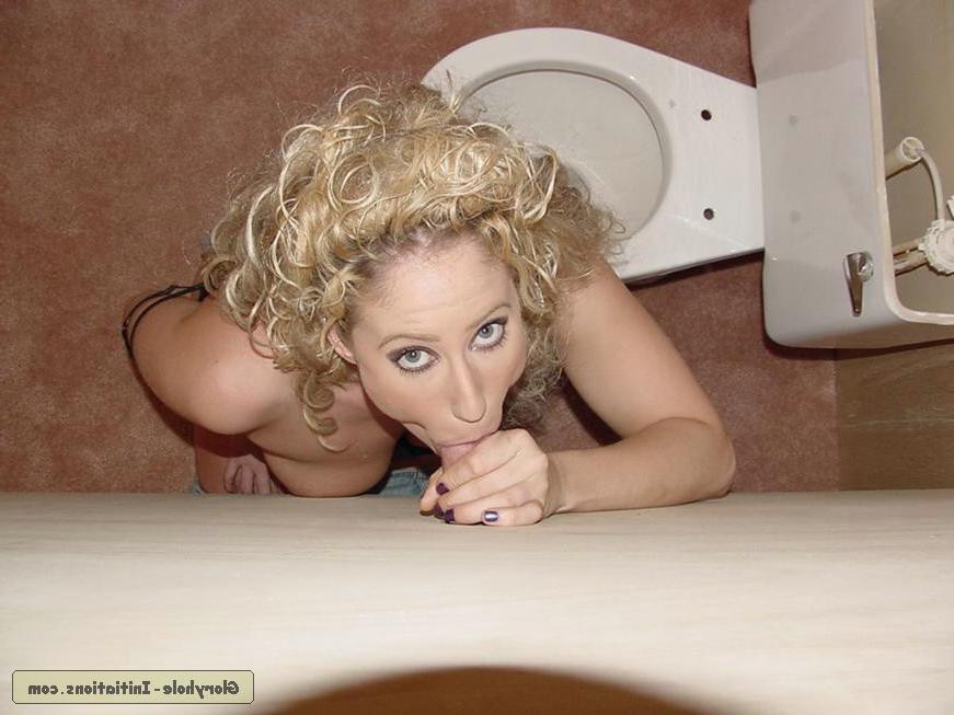 17P Curly-haired MILF Egypt bares big tits and sucks dick in gloryhole photo set