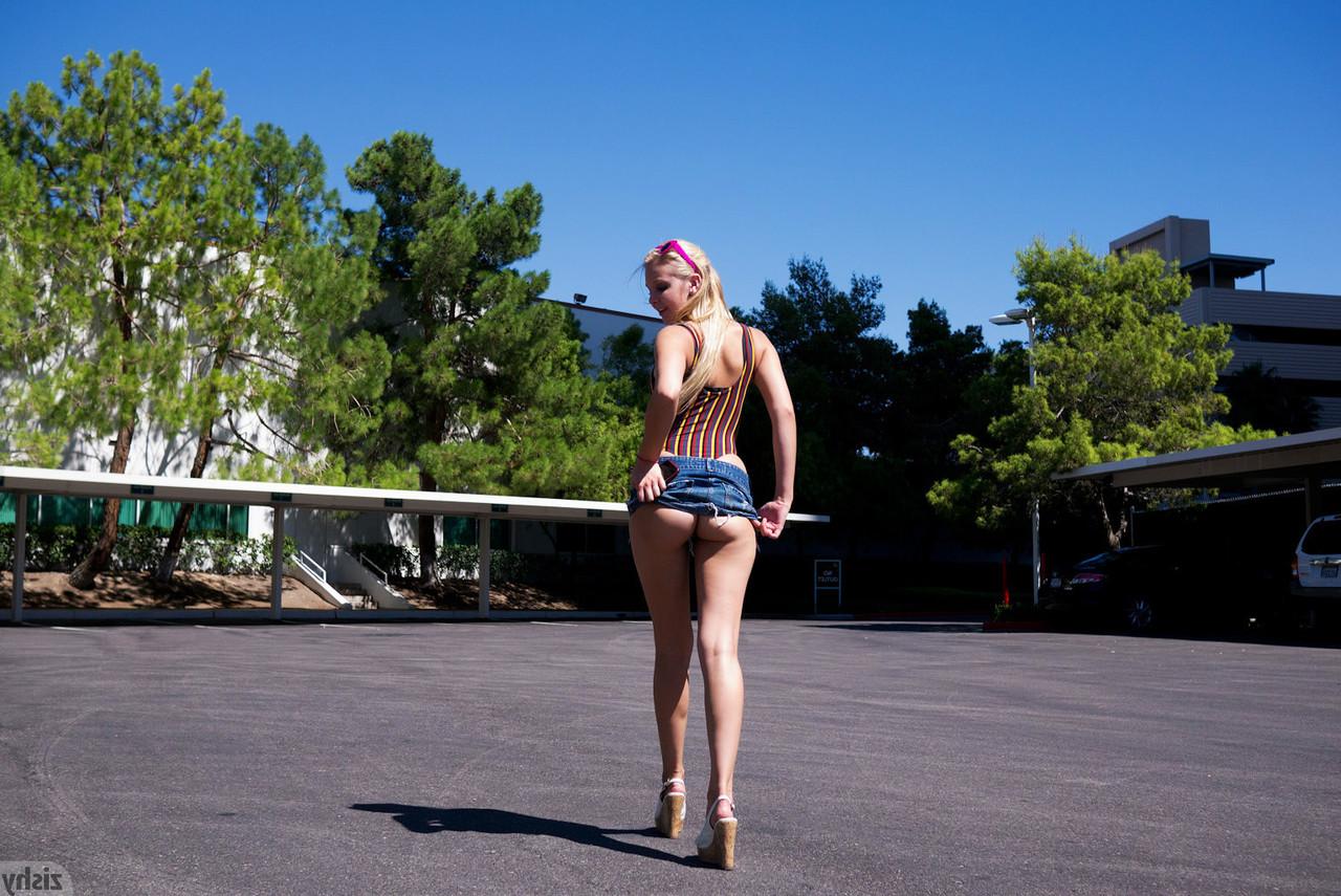 12P Teen girlfriend Issy Mai teases with her nice ass and legs outdoors