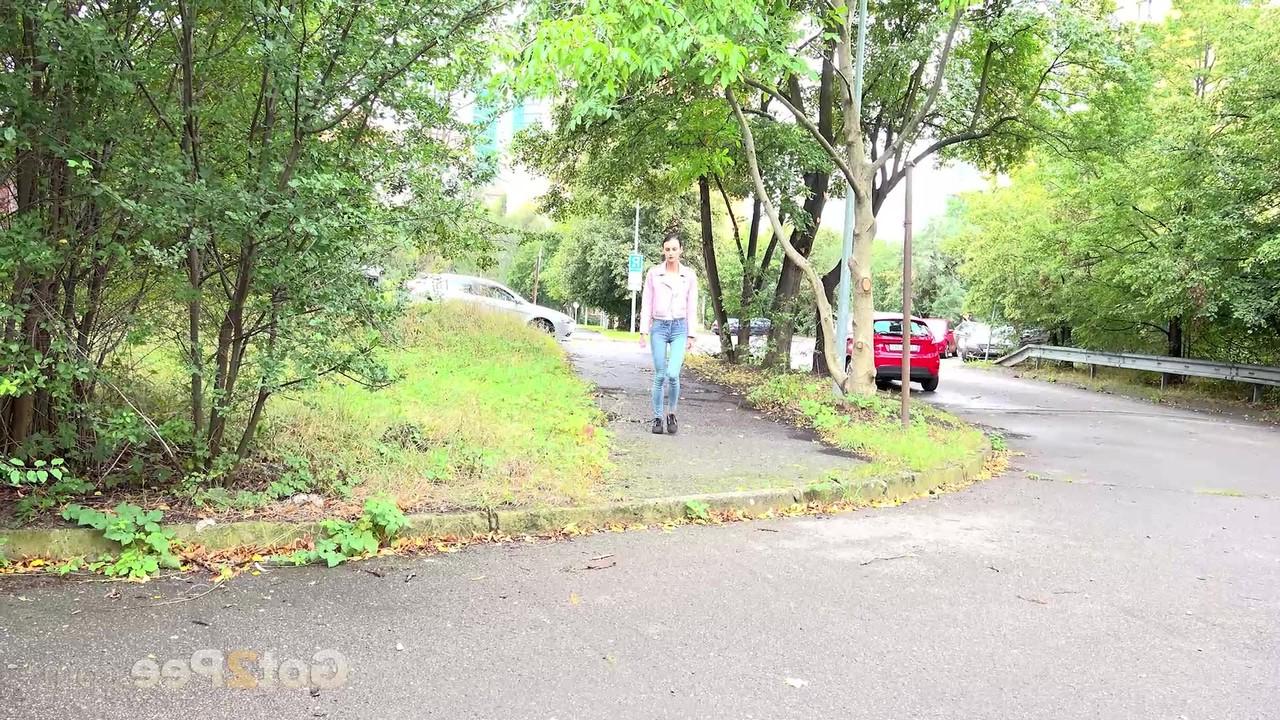 15P Young girl Adele Unicorn pulls down blue jeans to pee on a set of public steps