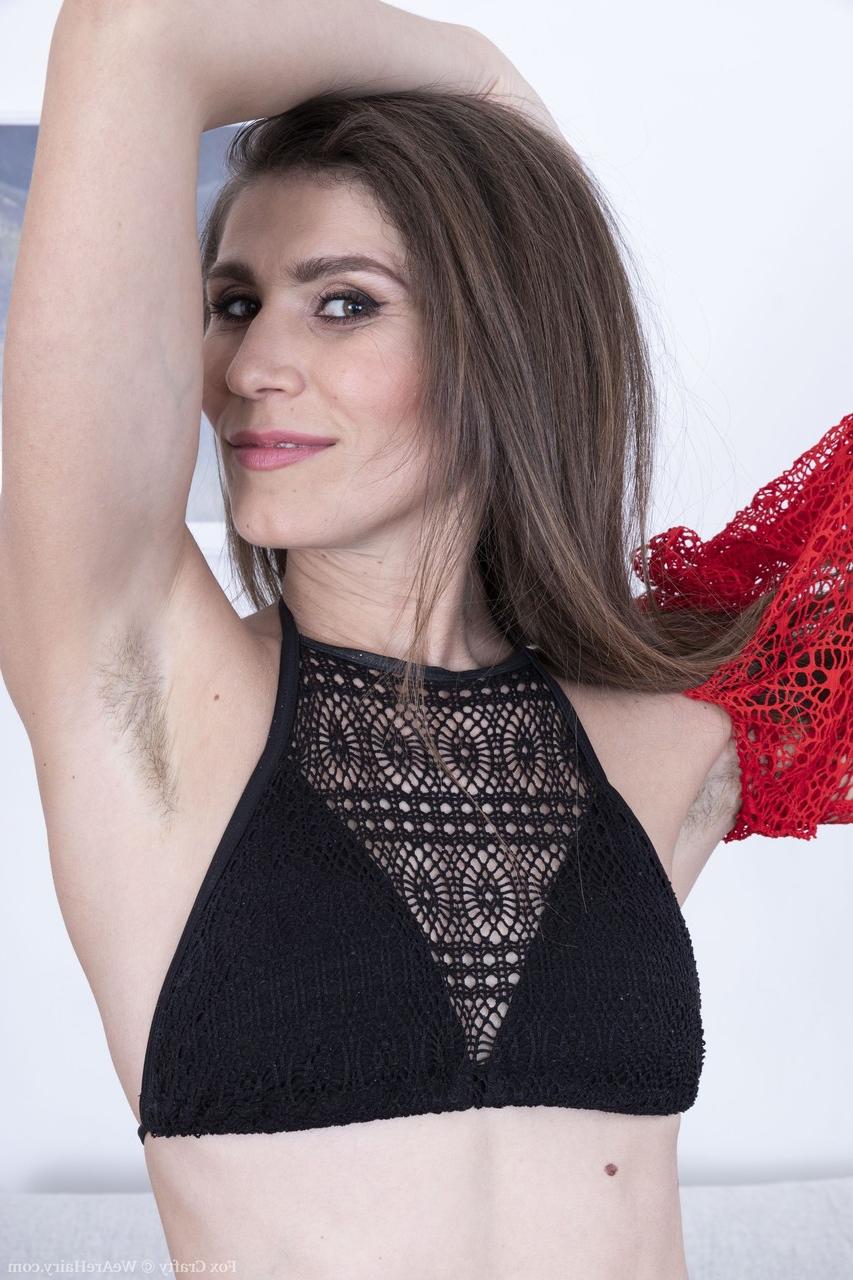 20P Brunette lady Fox Crafty displays her unshaved armpits and hairy beaver