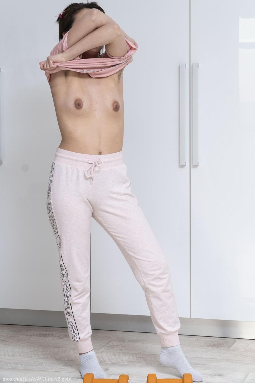 20P Amateur Alex Swon spreads her bushy muff & shows her hairy armpits in a solo