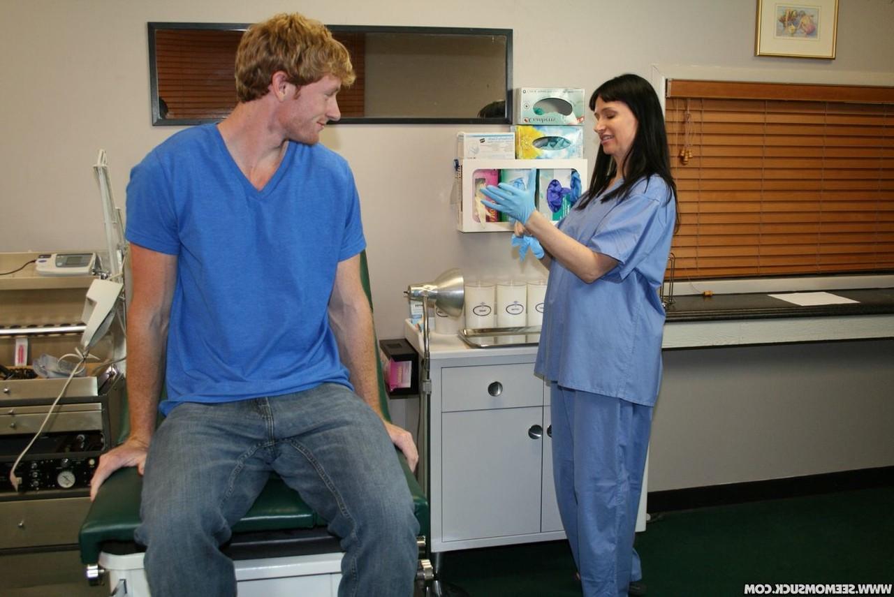 20P Dark haired MILF nurse gives a lovely blowjob to her horny patient