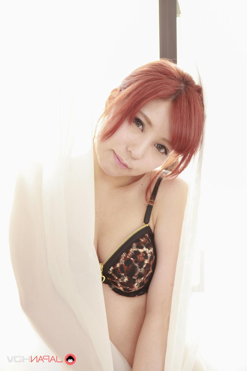 15P Hot Japanese redhead Saya Fujiwara takes off her lingerie in a tempting manner