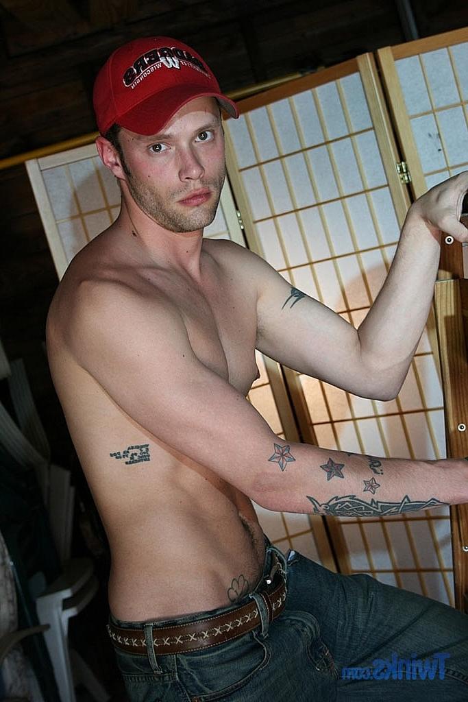 20P Tattooed twink Jack Wolfe unveils his big dick during a hot striptease
