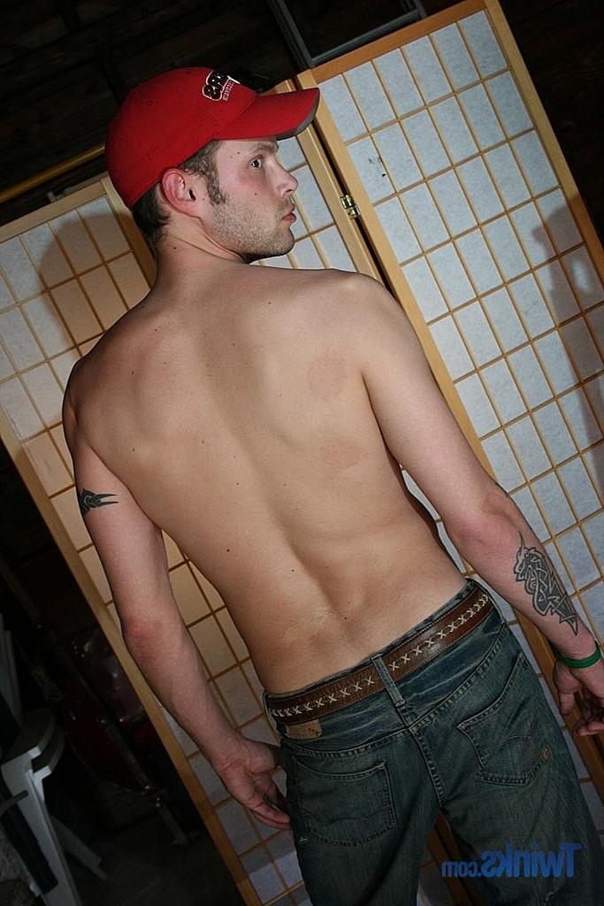 20P Tattooed twink Jack Wolfe unveils his big dick during a hot striptease
