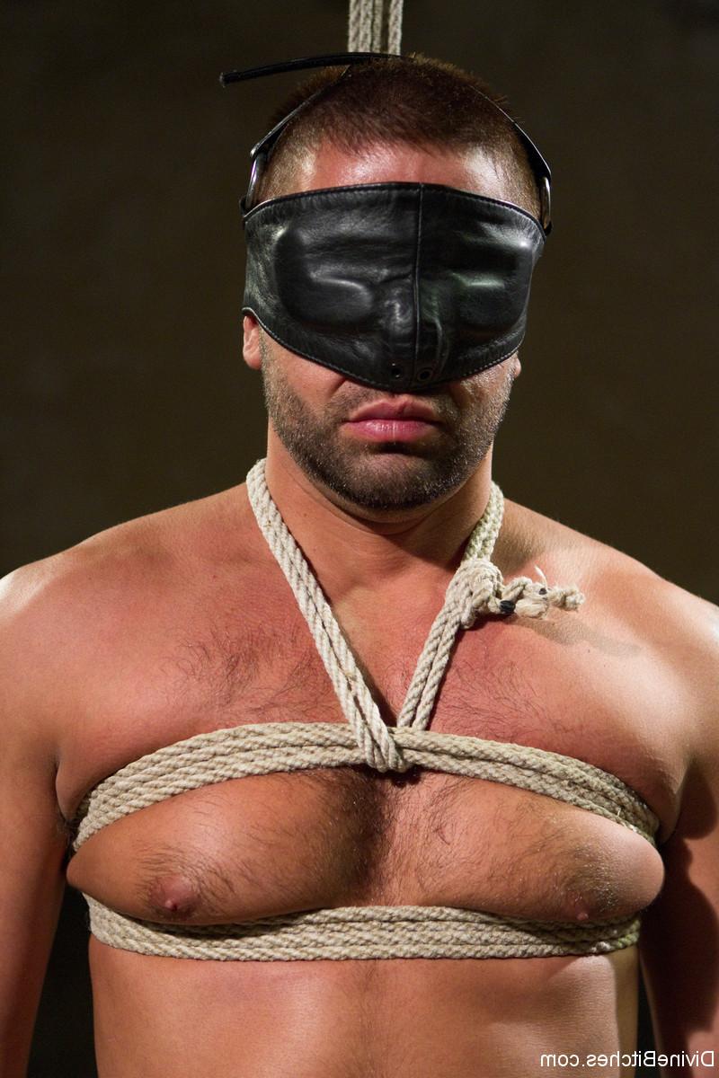 20P Sexy domme in a latex outfit Beretta James torments a masked slave's cock