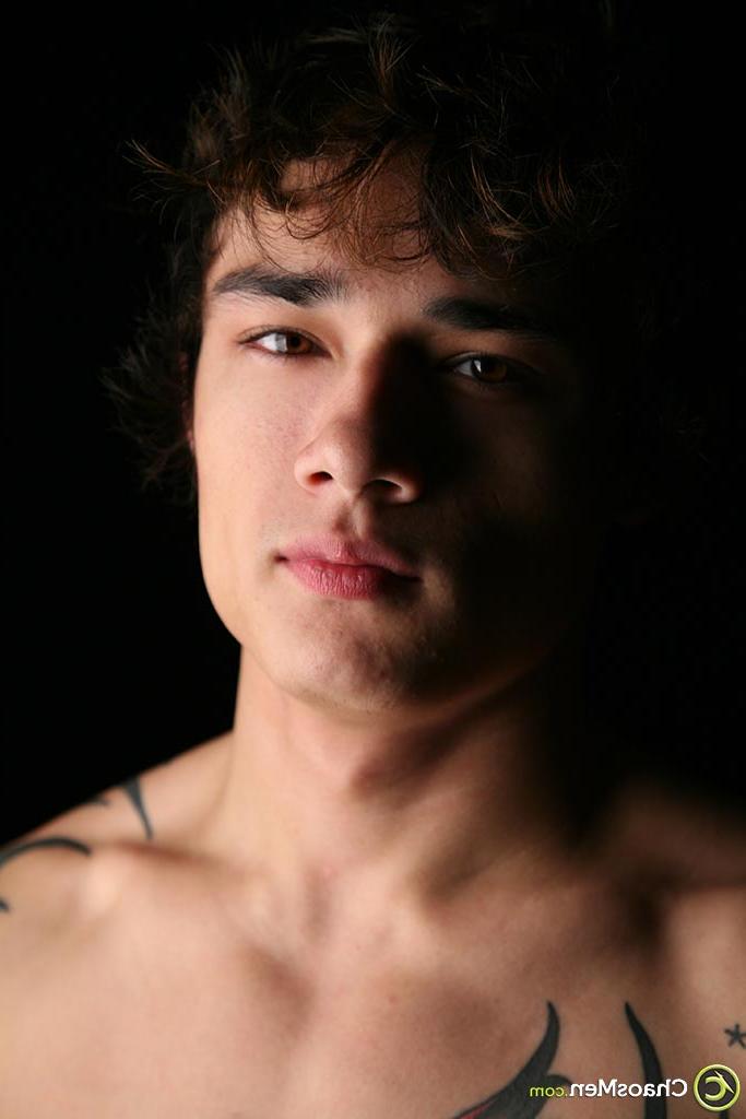 20P Cute brunette twink Jagger unveiling his tattooed body and hard boner