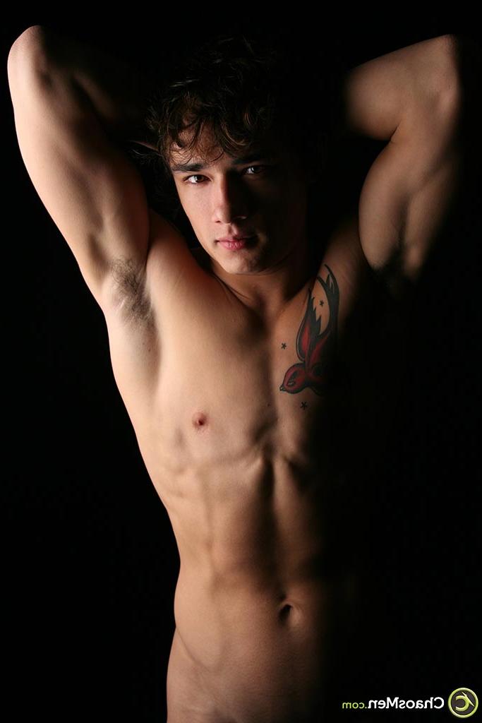 20P Cute brunette twink Jagger unveiling his tattooed body and hard boner