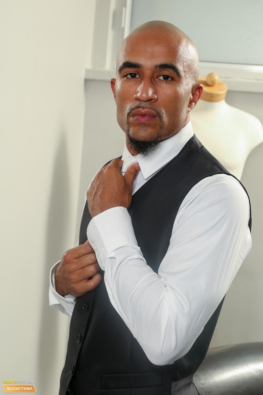 20P Muscular black stud King Noire takes off his suit to show his big erect dick