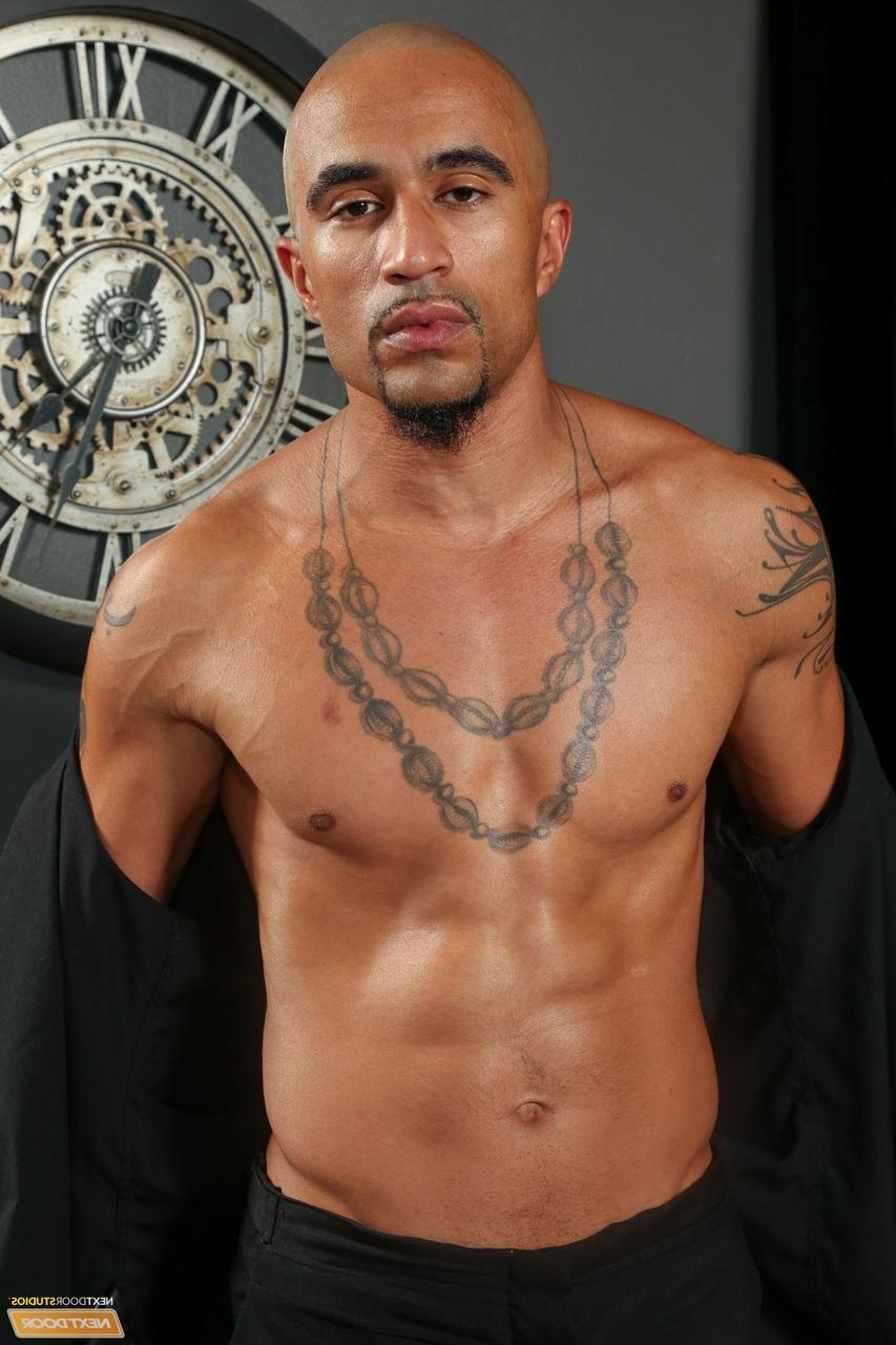 20P Muscular black stud King Noire takes off his suit to show his big erect dick